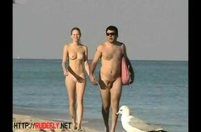Nudist family at the beach